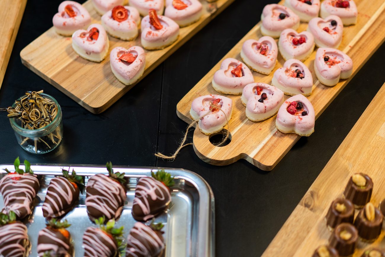 Raw mini-cakes and chocolate treats catering spread